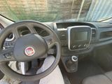 the interior of a car with a steering wheel and dashboard