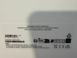 the back of a white box with a picture of a cell phone in it