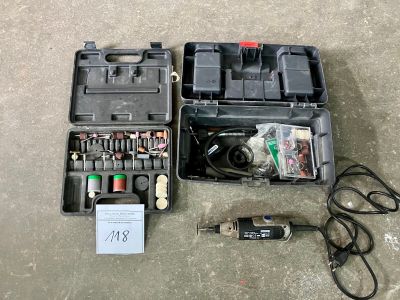 une boîte contenant des outils, posée sur le sol
