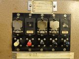 an old machine that has a lot of buttons on it
