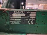 a close up of a green machine with a label on it