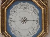 a clock that is hanging on the wall in the room