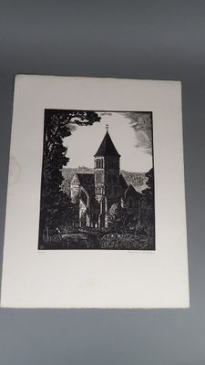 une photo en noir et blanc d'une église accrochée au mur