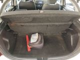 a trunk of a car with luggage in it
