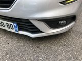 a close up of the front of a car with a license plate