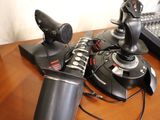 a lot of remote controls sitting on a wooden table