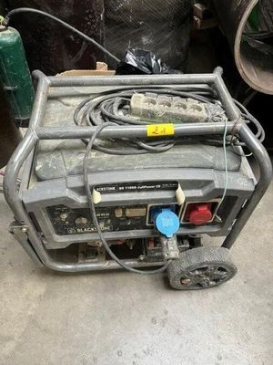 a small generator that is sitting on the ground