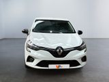the front view of a white car in a showroom