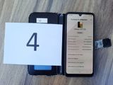 a picture of a phone that is open on a table