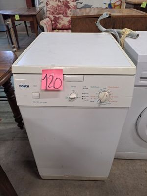 a washing machine and a dryer sitting on the floor