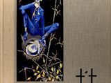 the cover of a book with a picture of a man in a blue suit sitting on top of a tree