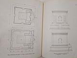 an open book with a drawing of a house and a drawing of a room