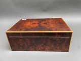 a small wooden box with a lid and a handle