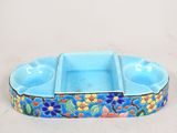 an image of a blue bowl with a flower design on it