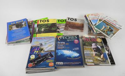 a lot of books that are sitting on a table