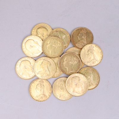 a pile of gold coins sitting on a white surface