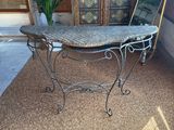 a table that has a mirror on top of it