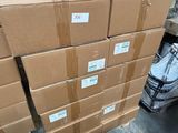 boxes stacked on top of each other in a warehouse
