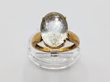 an image of a ring with a white diamond on it