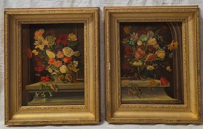 painting of flowers in a gold frame on a white background