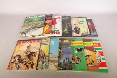 a lot of books that are sitting on a table