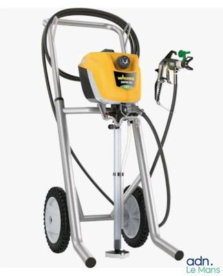 a close up of a sprayer with a hose attached to it