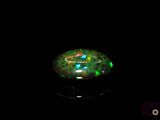 an image of a glowing object in the dark