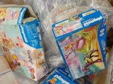 a lot of toys in a plastic bag on a table