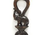 an image of a wooden handle with an elephant on top of it