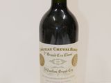 a bottle of wine that is sitting on a table