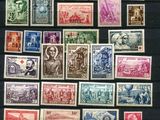 a collection of stamps from around the world