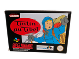 a box of nintendo games on a white surface