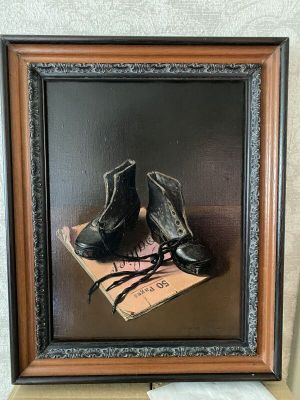painting of a pair of black shoes on top of a box