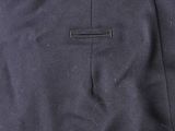 a close up of a man ' s pants with a tie