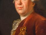 portrait of a man in a red coat in a gold frame