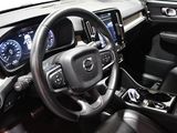 a steering wheel and dashboard of a car on display