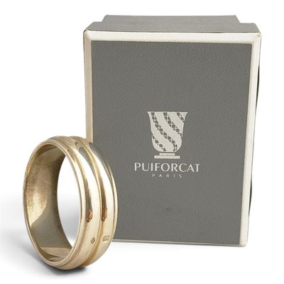 a close up of a box with a ring in it