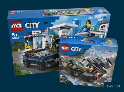 Deux boîtes de véhicules Lego City sont représentées sur un fond bleu.