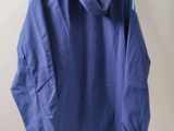 an image of a blue jacket hanging on a white wall