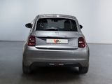 a silver car that is parked in a room