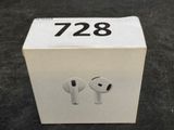 a box with two airpods in it sitting on a table