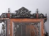 a mirror that is sitting on top of a shelf