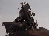 a machine that is sitting on top of a piece of metal