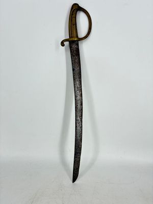 a close up of a knife on a white surface with a white background