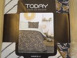 the bedding is in the package on the wooden floor