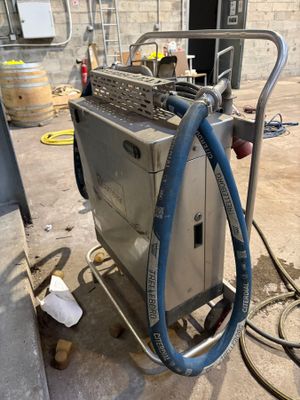 a machine that has a hose attached to it