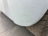 a close up of a car tire with a flat tire