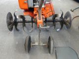 a small machine that is sitting on the ground