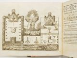an open book with a drawing of a building on it