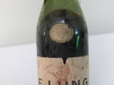 a bottle of wine that is sitting on a table